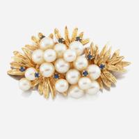 A collection of gold, cultured pearl, and sapphire jewelry