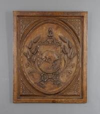 A Carved Oak Relief Panel, Height 24 x width 19 1/2 inches.