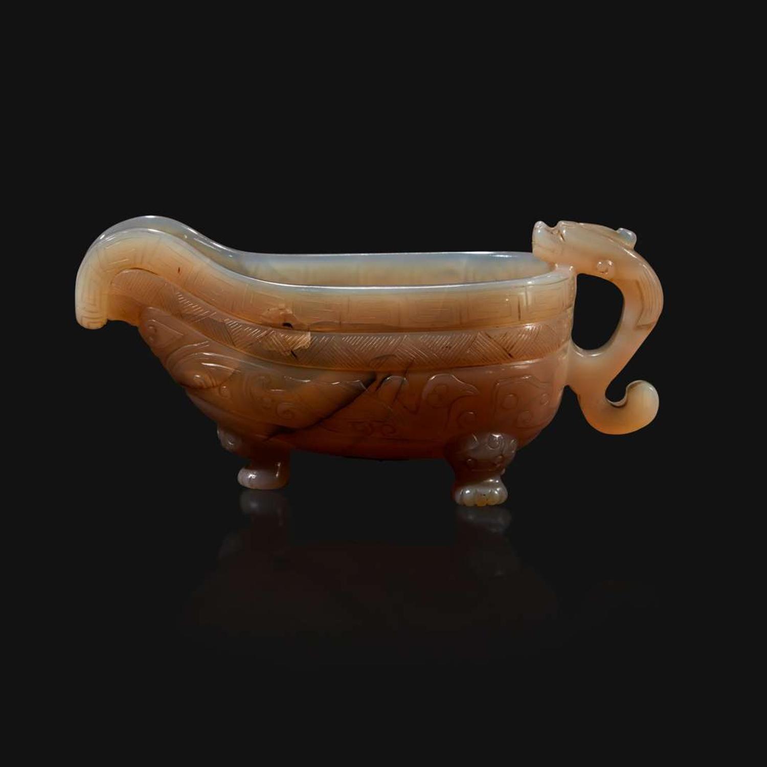 A Chinese archaistic carved agate libation cup, Yi Qing dynasty, 18th/19th century