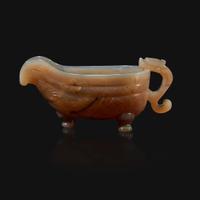A Chinese archaistic carved agate libation cup, Yi Qing dynasty, 18th/19th century
