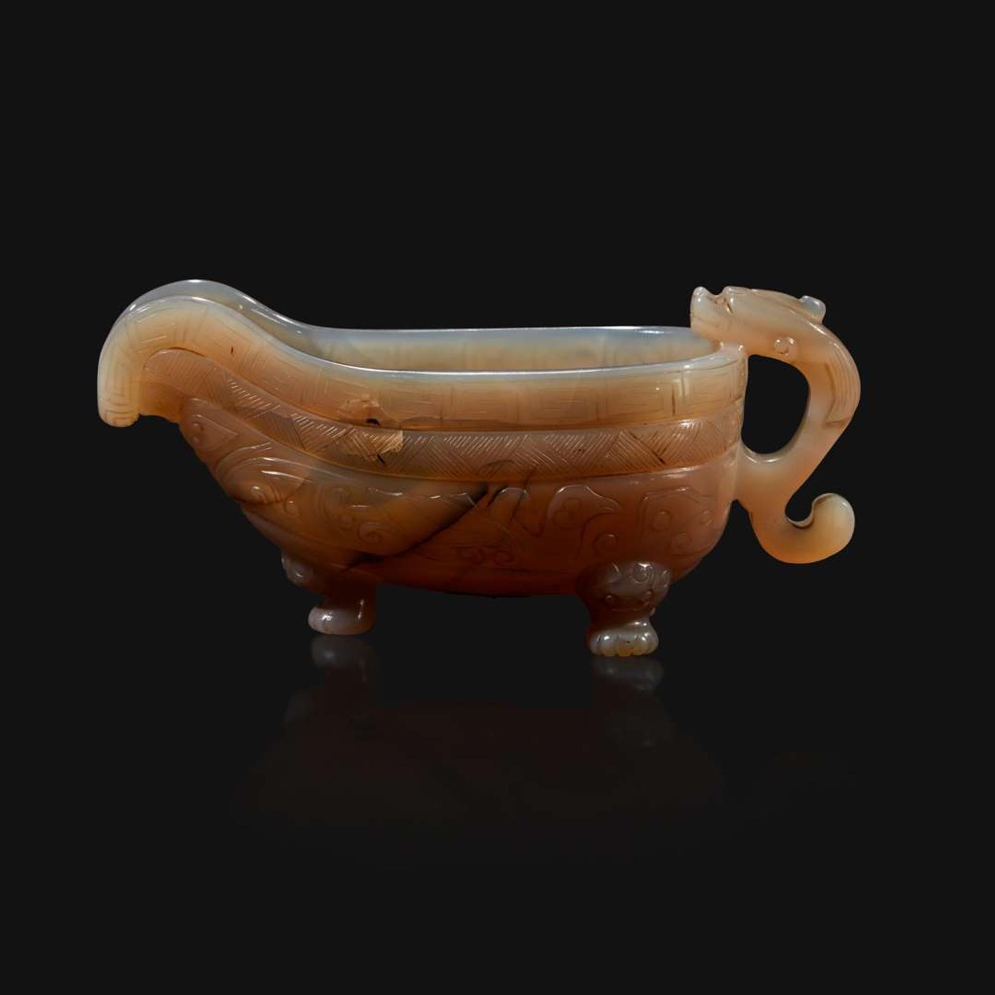 A Chinese archaistic carved agate libation cup, Yi Qing dynasty, 18th/19th century
