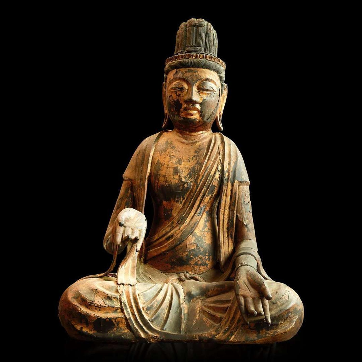 A large Japanese gilt lacquered wood figure of a seated bodhisattva Heian- Kamakura period or later