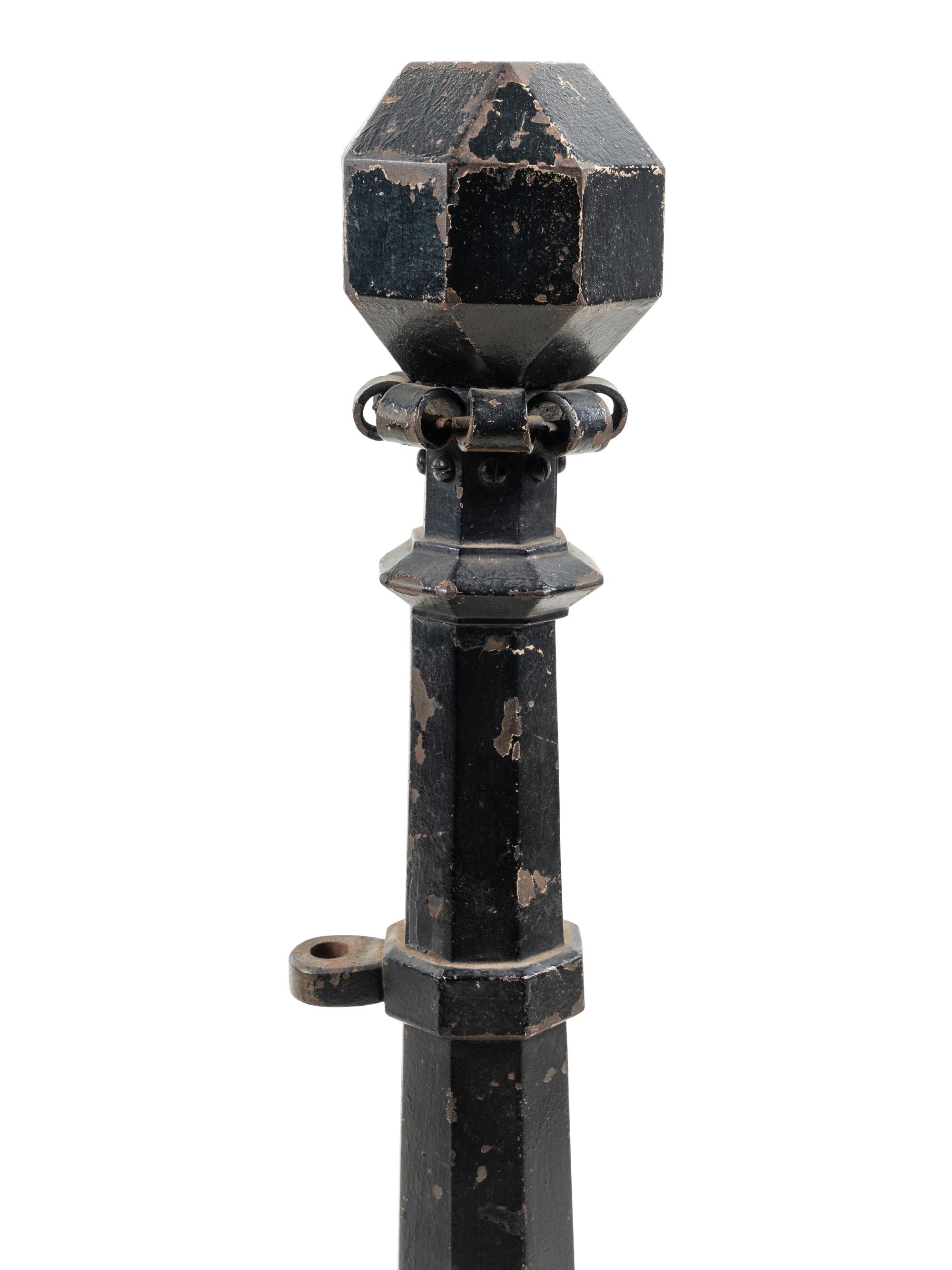 A Pair of Continental Iron Andirons