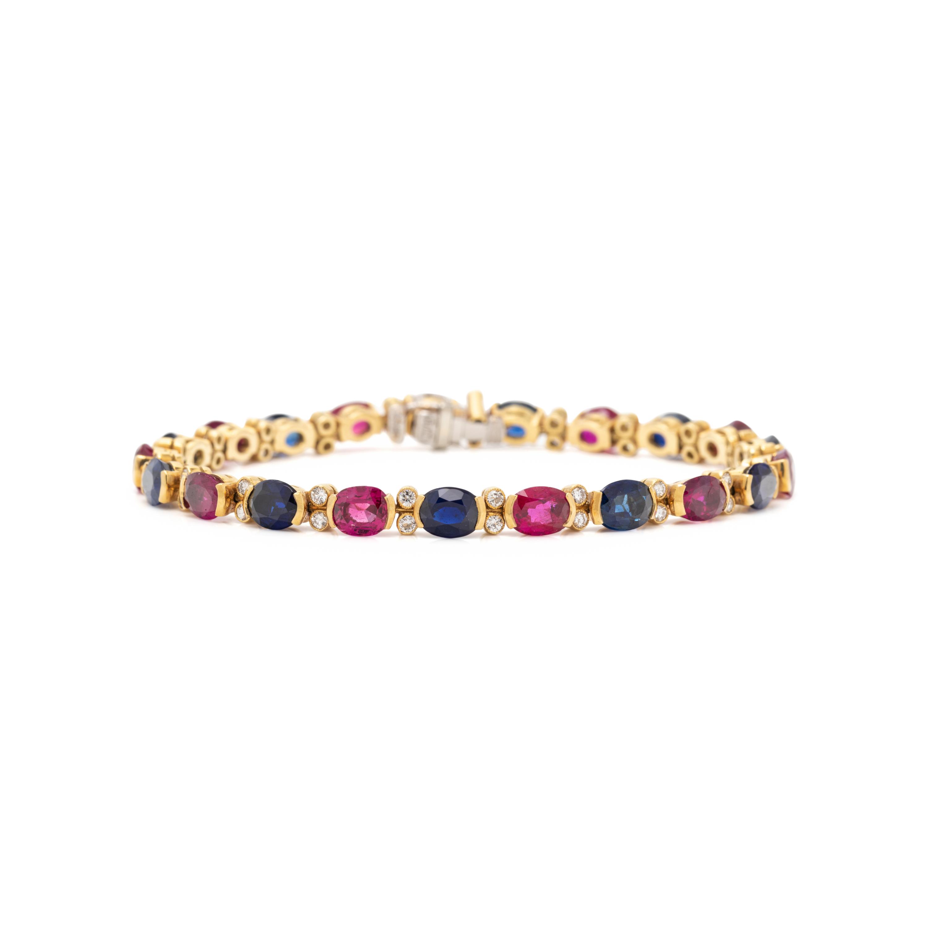 JULIUS COHEN, RUBY, SAPPHIRE AND DIAMOND BRACELET