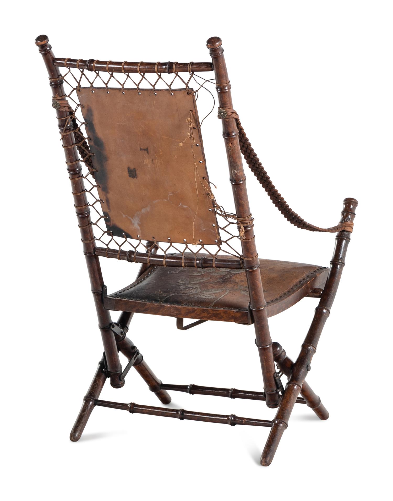 A Pair of English Aesthetic Movement Walnut Folding Chairs