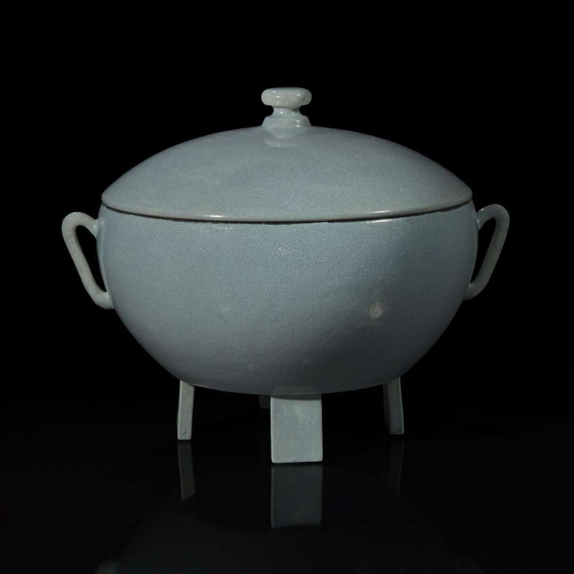 An unusual Chinese pale blue-glazed porcelain vessel with cover 淡蓝釉带盖瓷罐 Xuande mark ???
