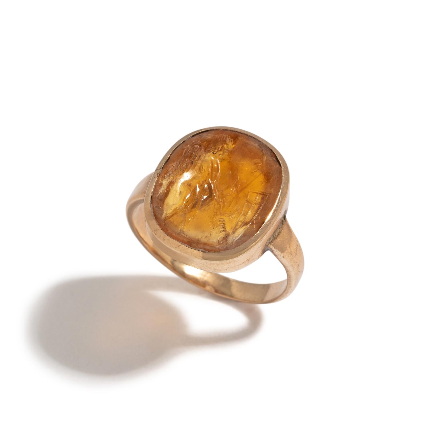 A Neoclassical Gold and Citrine Finger Ring with the God Eros