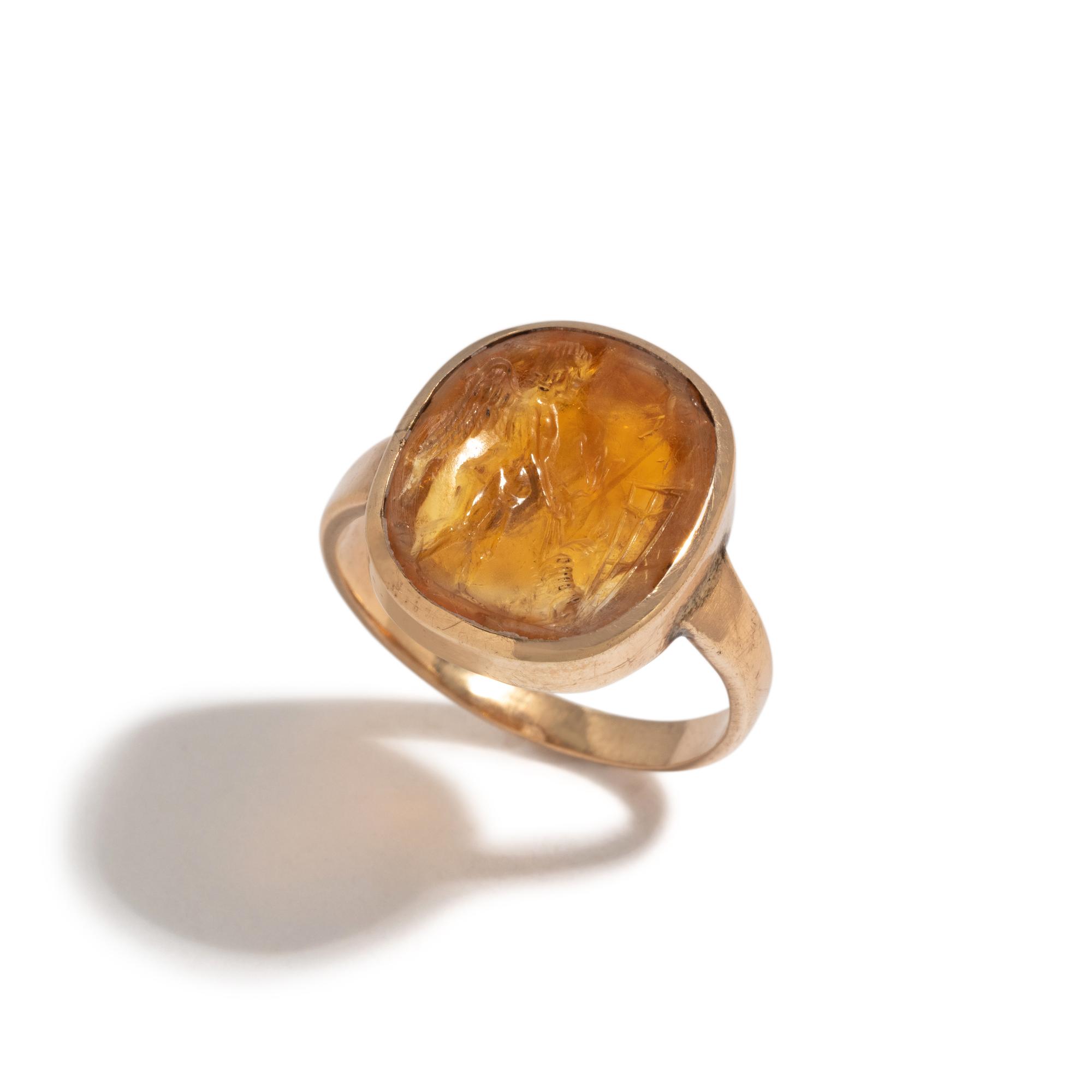 A Neoclassical Gold and Citrine Finger Ring with the God Eros
