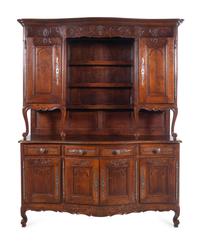A Louis XV Provincial Carved Walnut Buffet à Deux Corps