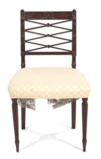 A Pair of Regency Style Carved Mahogany Side Chairs Height 33 1/4 inches.