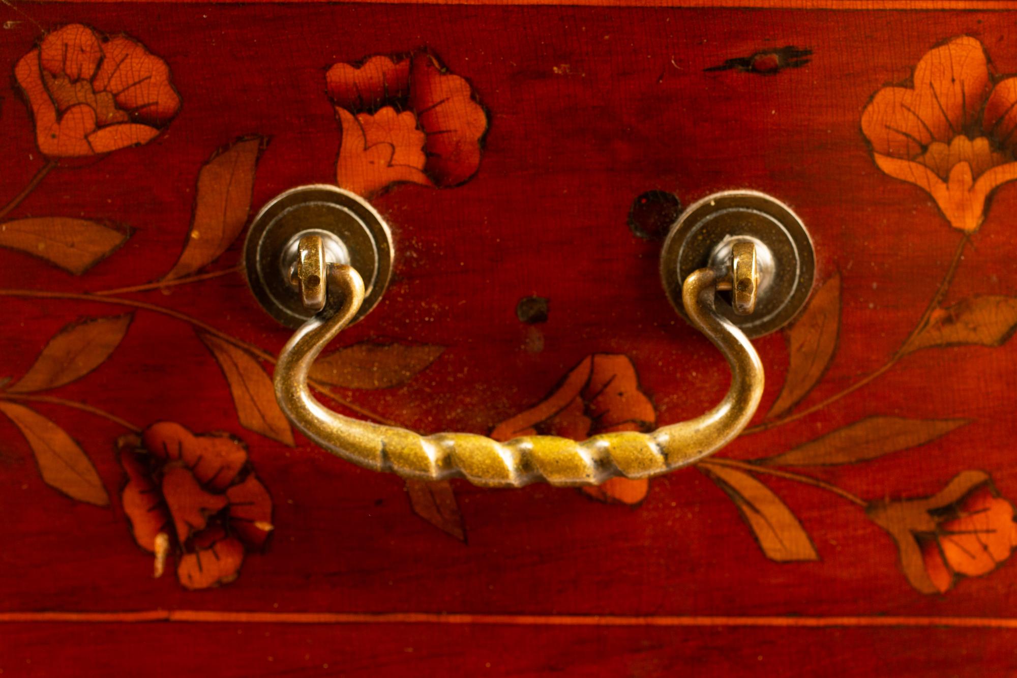 A Dutch Marquetry Inlaid Chest of Drawers — 19TH CENTURY