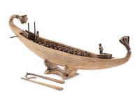 An Egyptian Style Carved Wood Boat Model