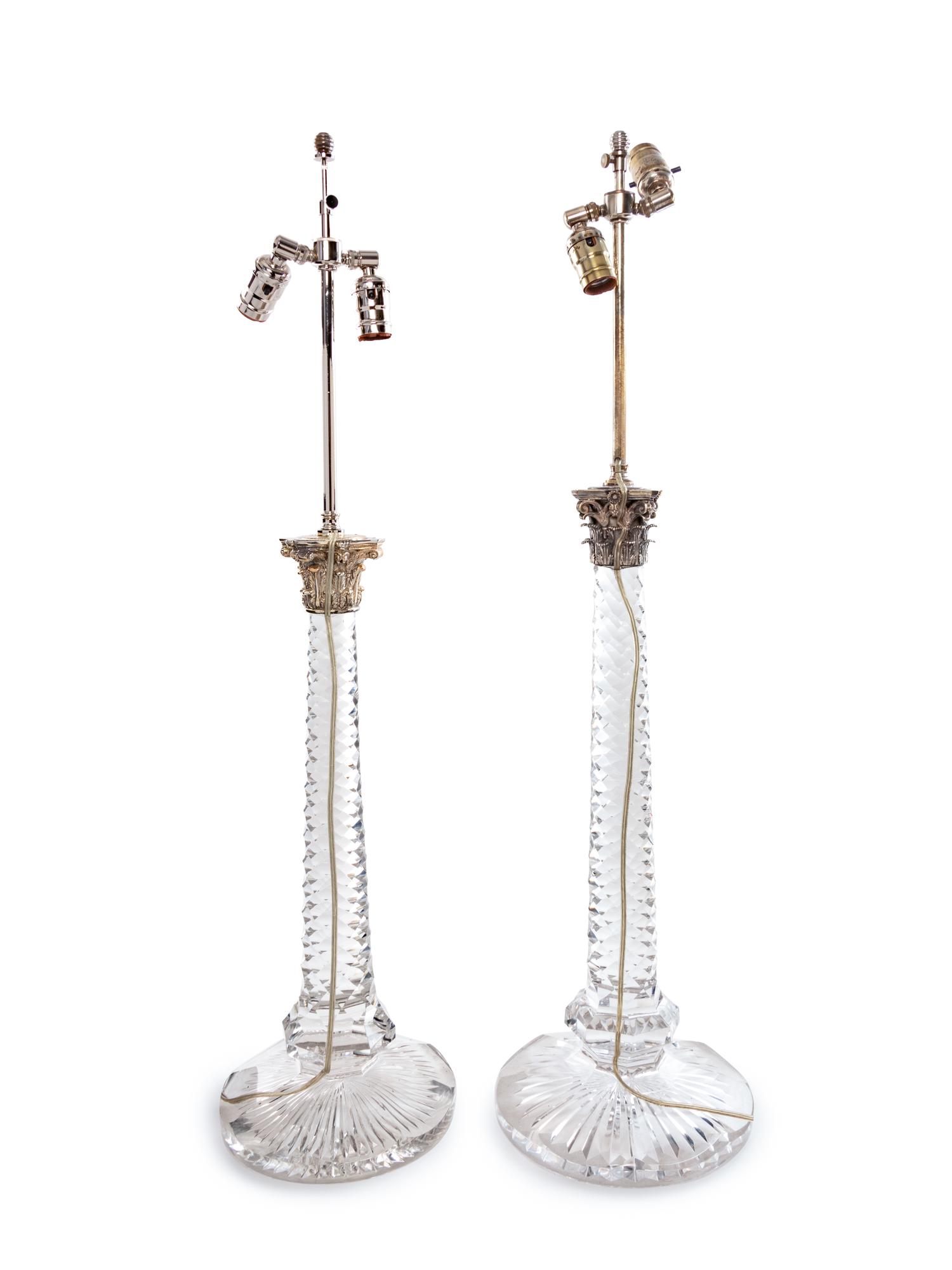 A Near Pair of Baccarat Cut Glass and Silvered Metal Mounted Lamps