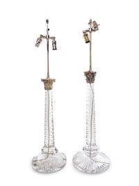 A Near Pair of Baccarat Cut Glass and Silvered Metal Mounted Lamps