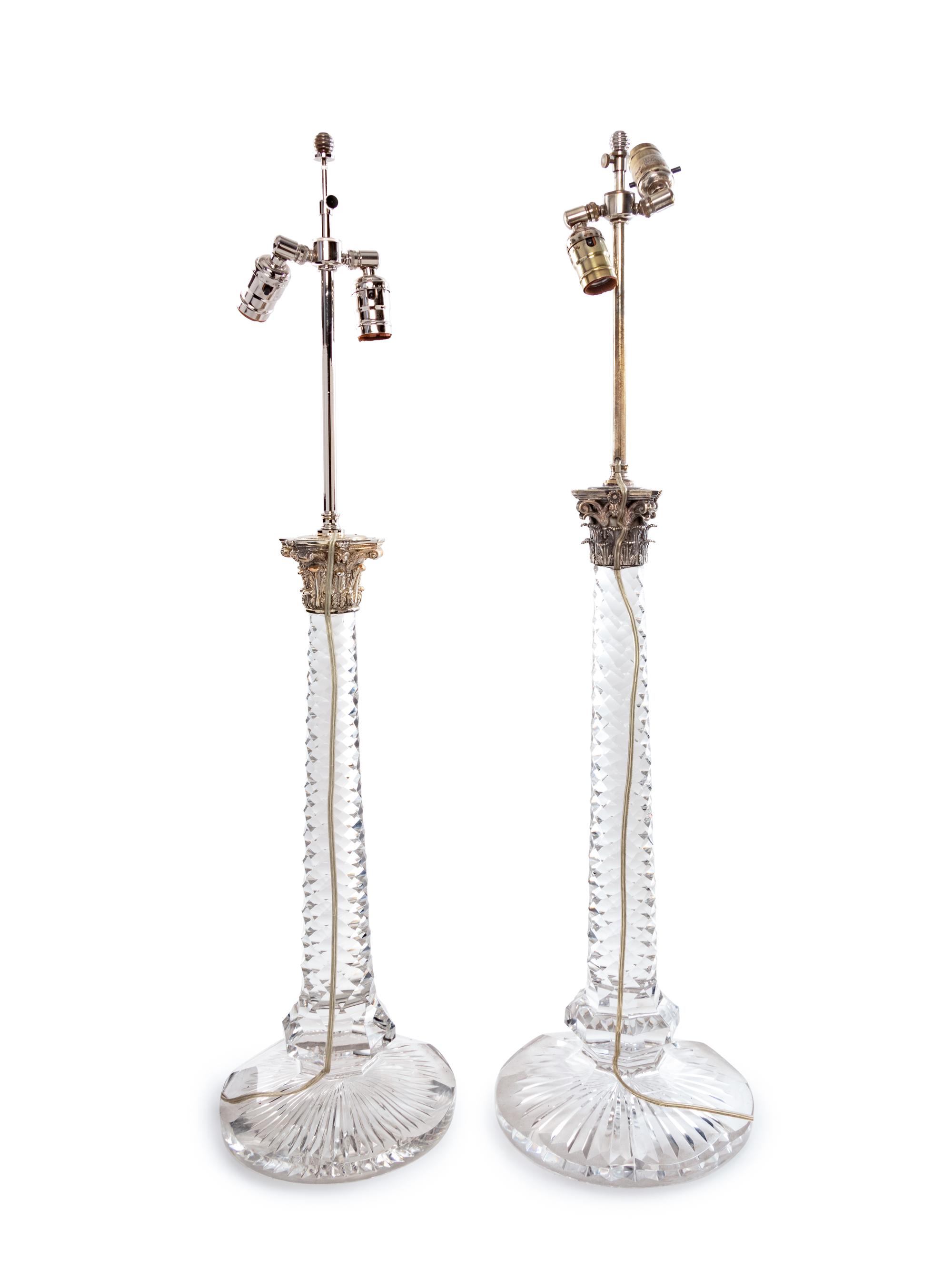 A Near Pair of Baccarat Cut Glass and Silvered Metal Mounted Lamps