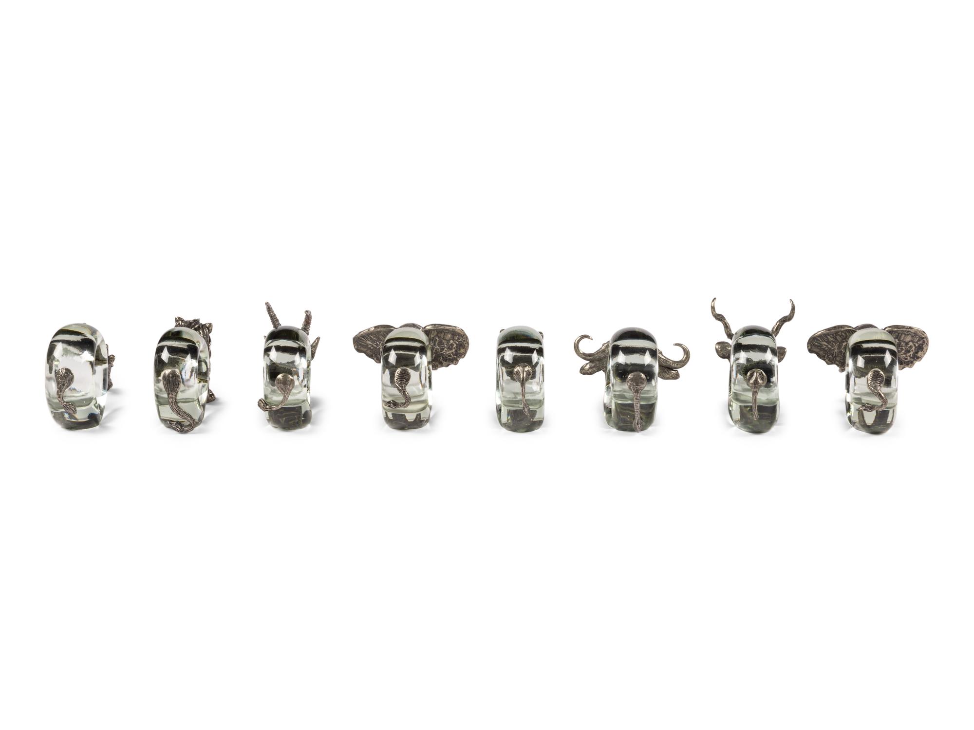A Set of Eight Ngwenya Glass and Pewter Animal-Form Napkin Rings