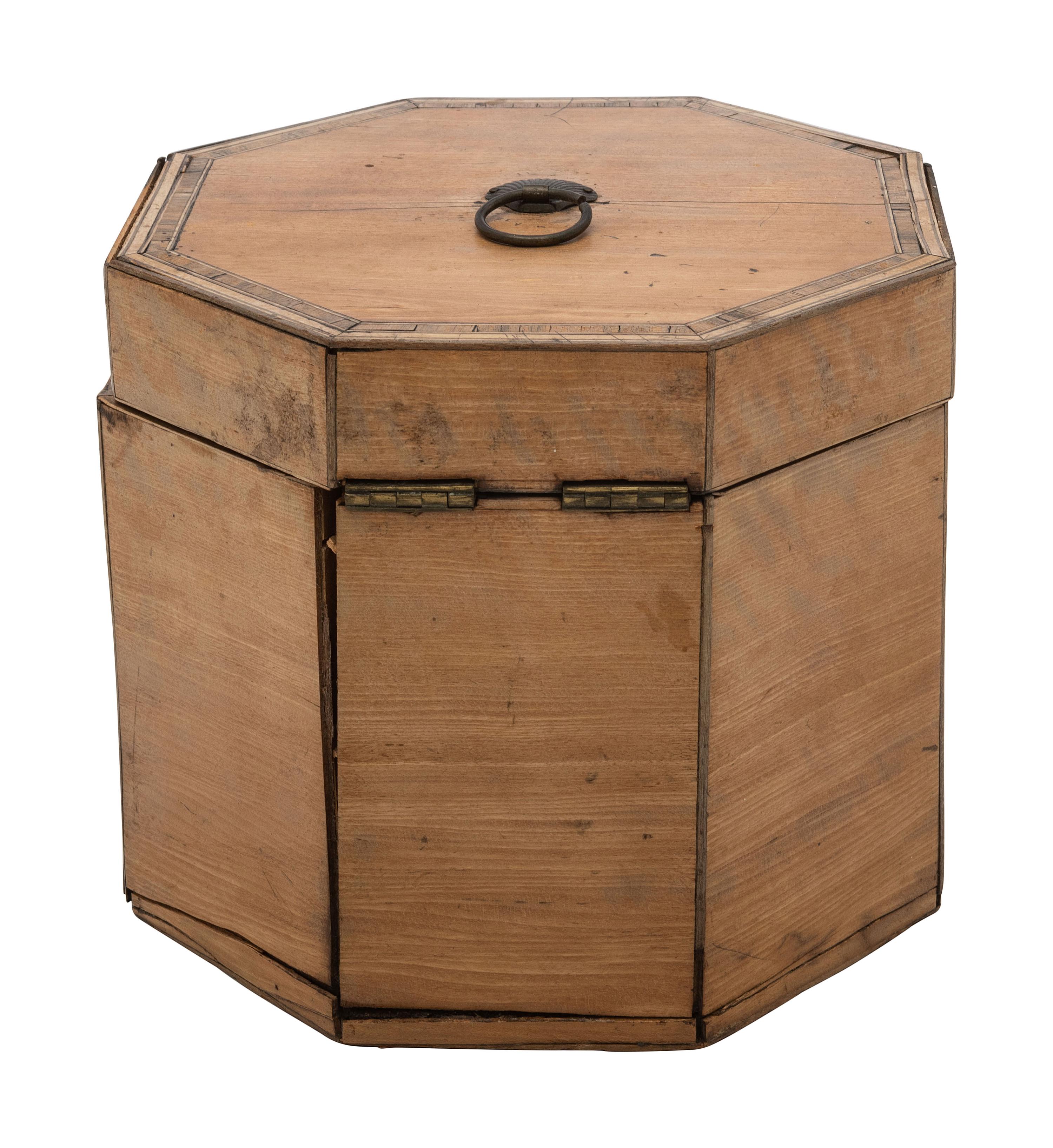 A George III Octagonal Walnut Tea Caddy with Satinwood Inlay