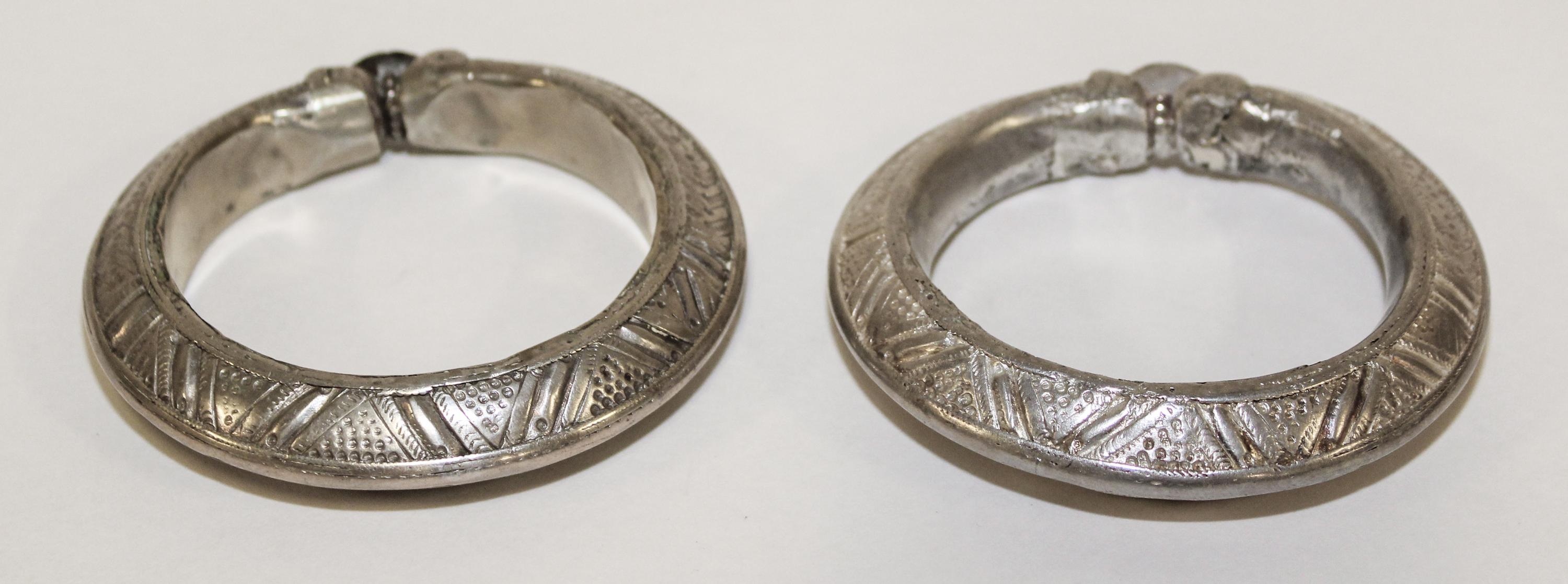 A Pair of Yemeni Silver Bangles Diameter of exterior 3 3/4 inches.