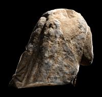 A Roman Marble Draped Torso from a Relief