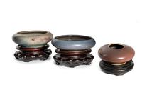 Three Porcelain Monochrome Glazed Circular Brush Washers