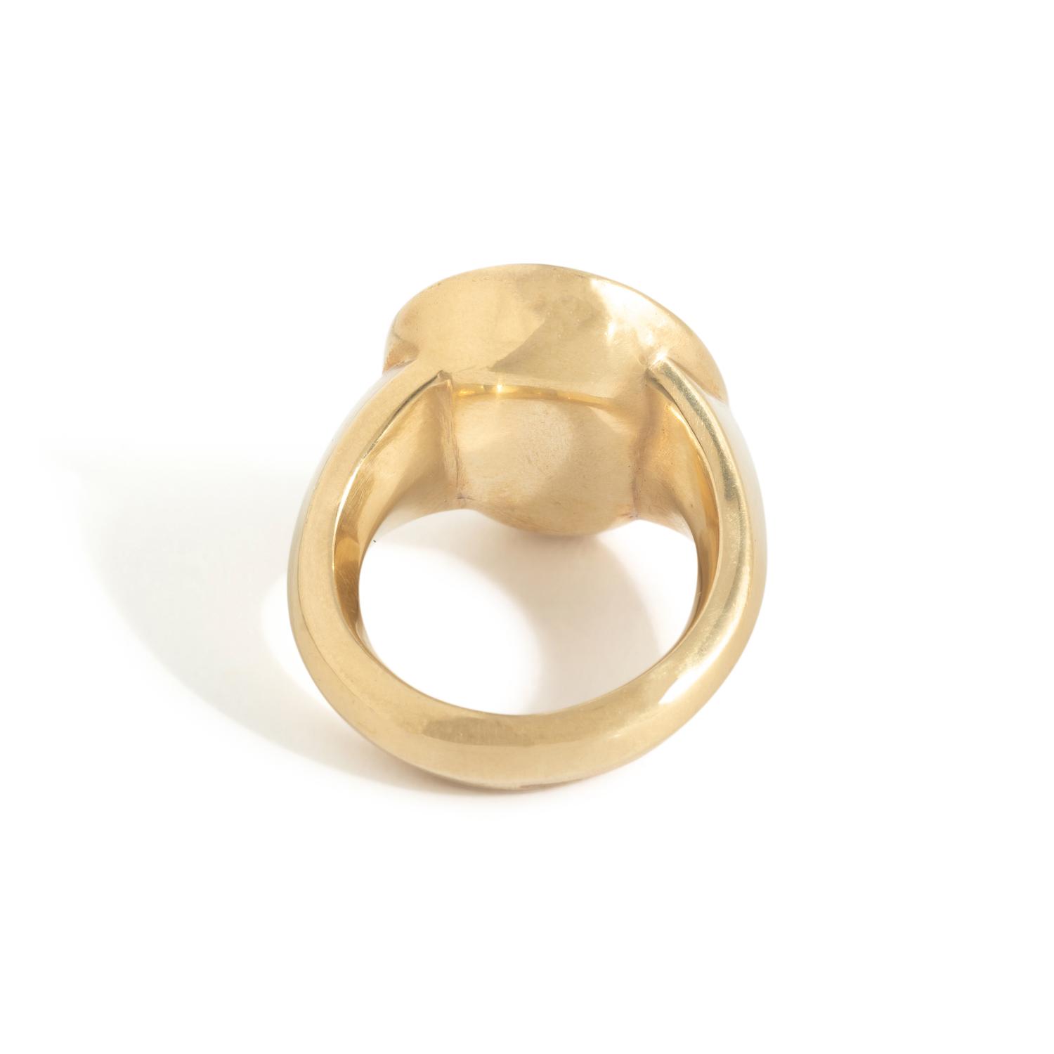 A Roman Carnelian Ring Stone with Two Male Deities and a Child — Set in a gold ring