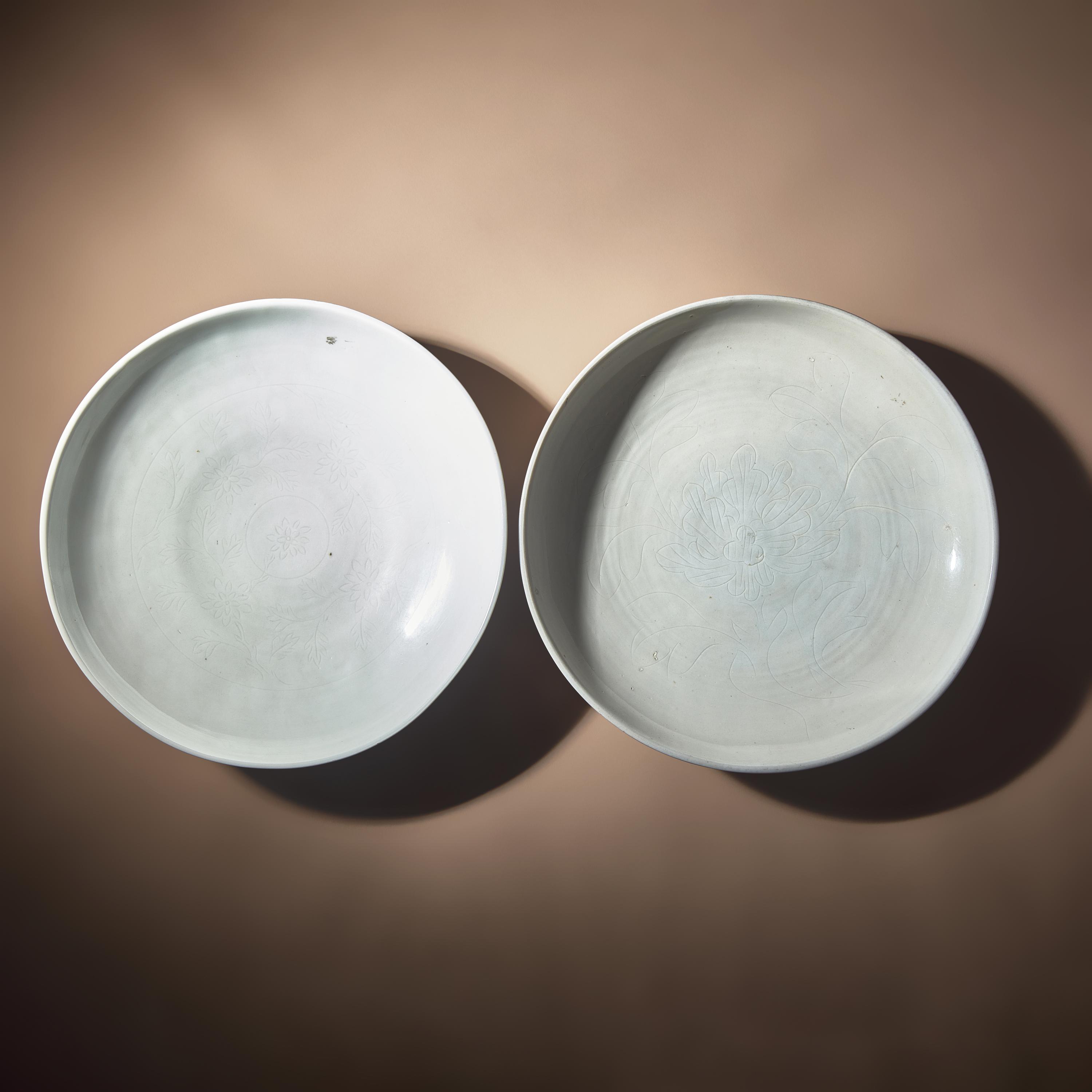 Two Large Chinese Incised Blanc-de-Chine Porcelain 'Floral' Dishes, 17th Century — 清早中期 德化白瓷暗刻花卉紋盤兩件