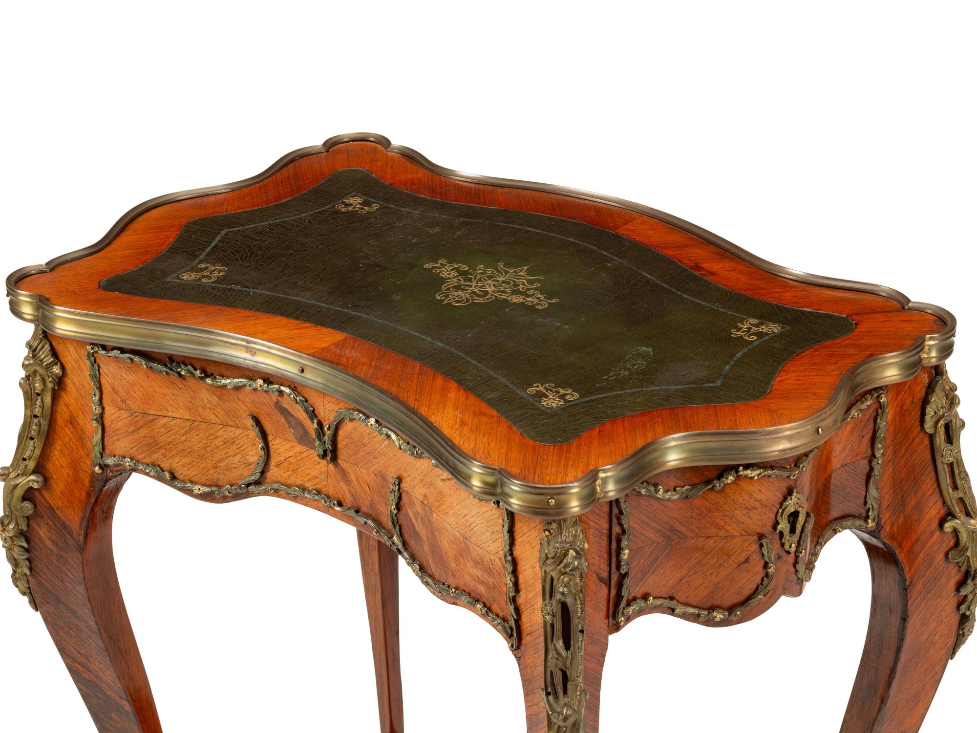 A Louis XV Style Gilt Bronze Mounted Parquetry Writing Table