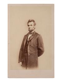 [LINCOLN, Abraham (1809-1865)]. A group of 12 CDVs of political figures, highlighted by a standing portrait of Abraham Lincoln.