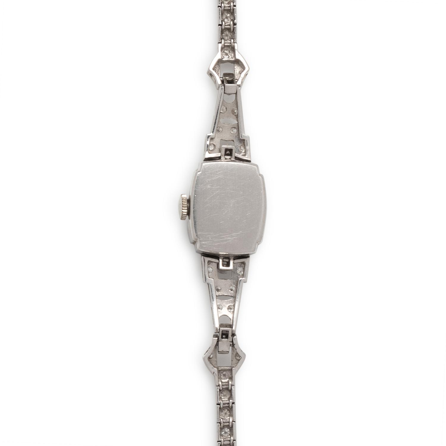 GRUEN, PLATINUM AND DIAMOND WATCH