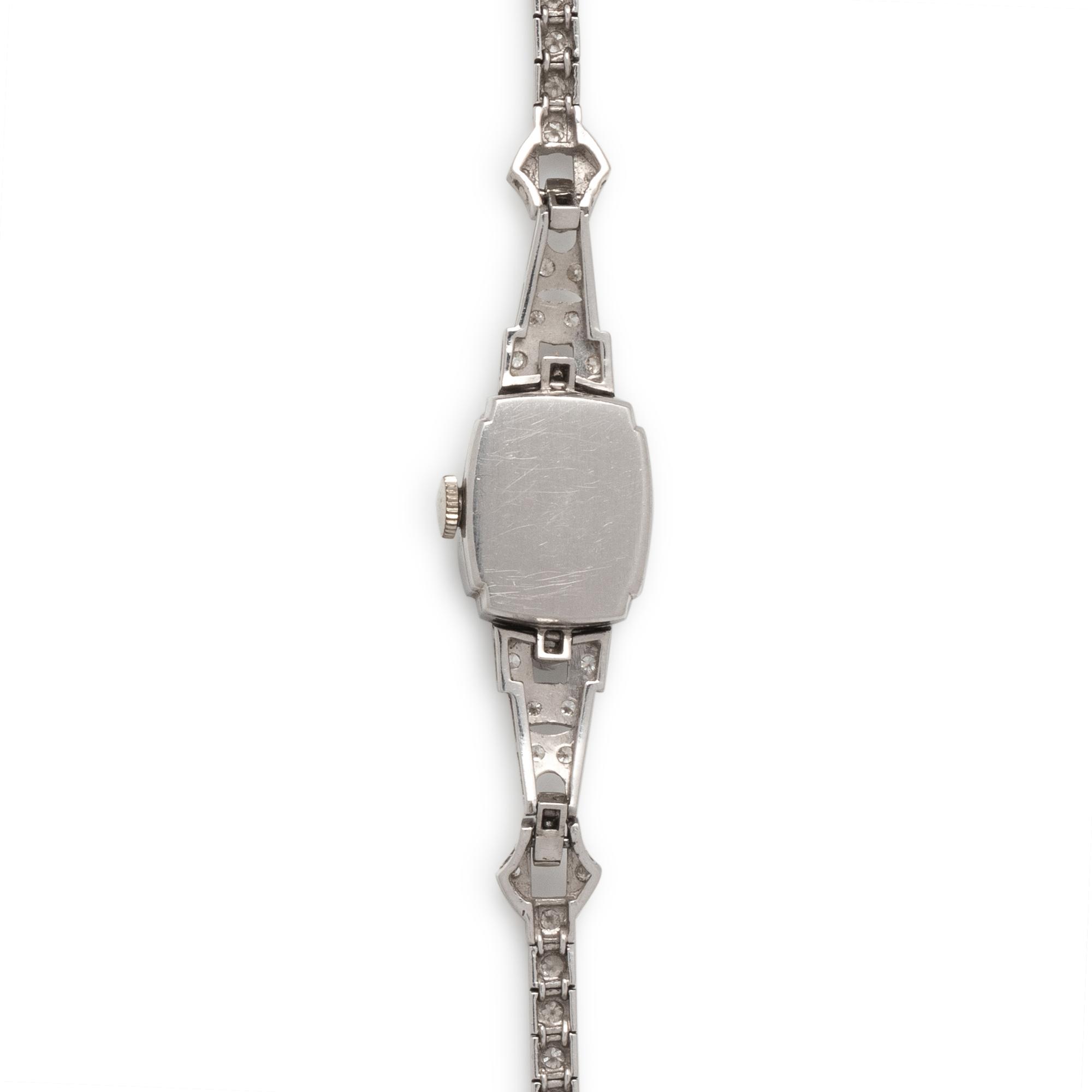 GRUEN, PLATINUM AND DIAMOND WATCH