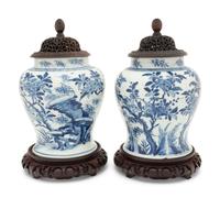 A Pair of Chinese Blue and White Porcelain Ginger Jars with Pierced Wood Lids and Stands