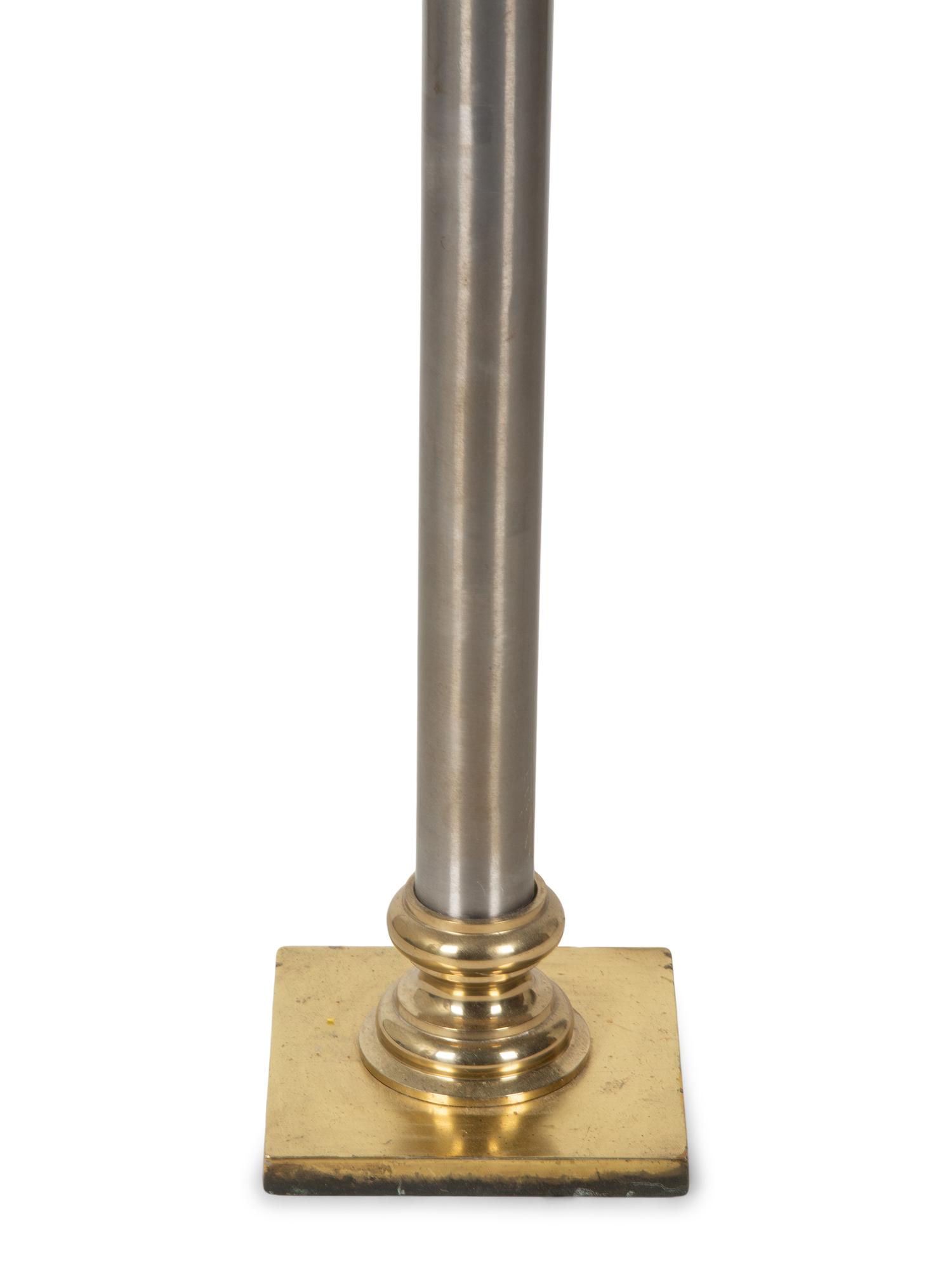 A Steel and Brass Floor Lamp — 20TH CENTURY
