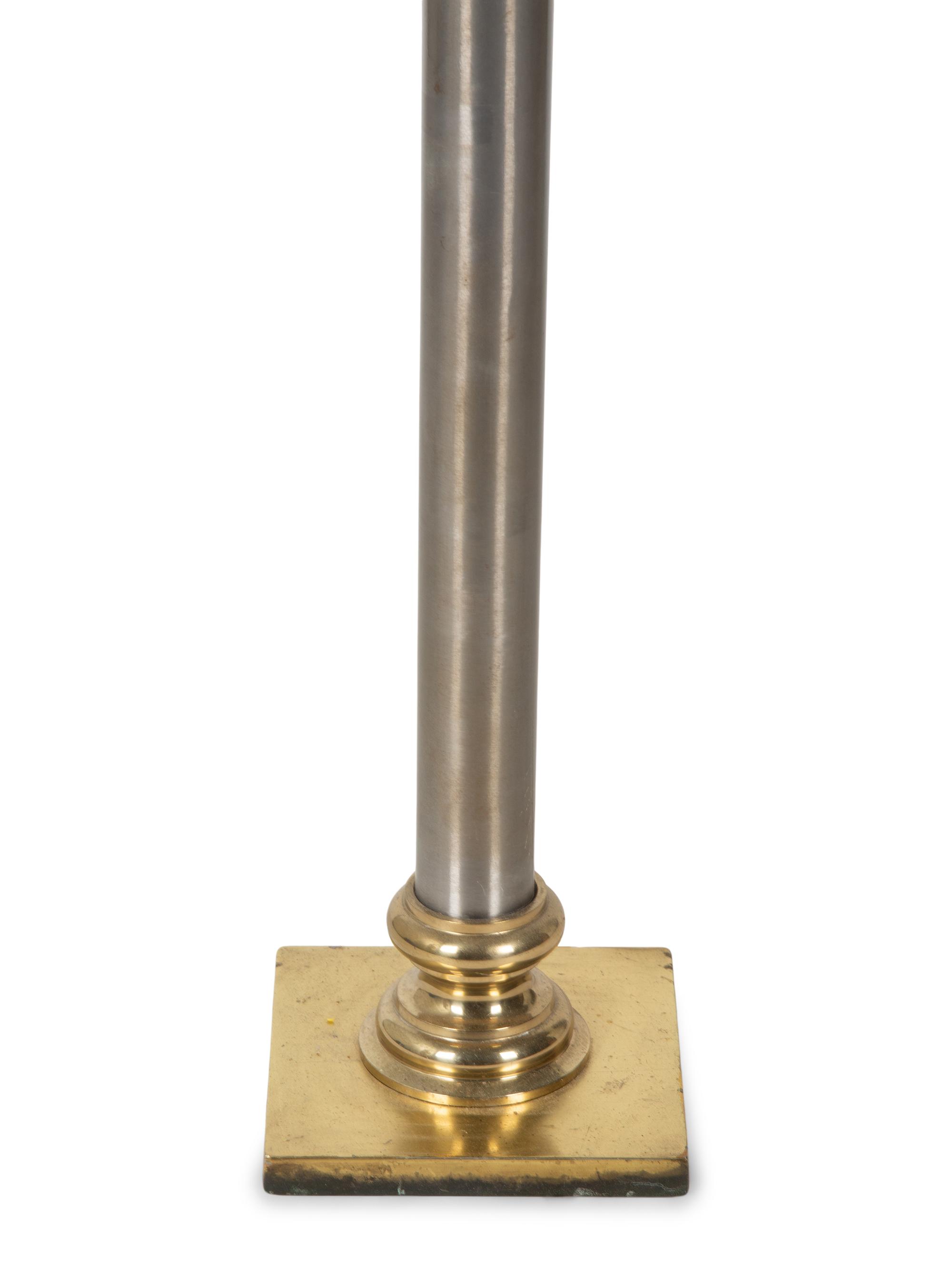 A Steel and Brass Floor Lamp — 20TH CENTURY