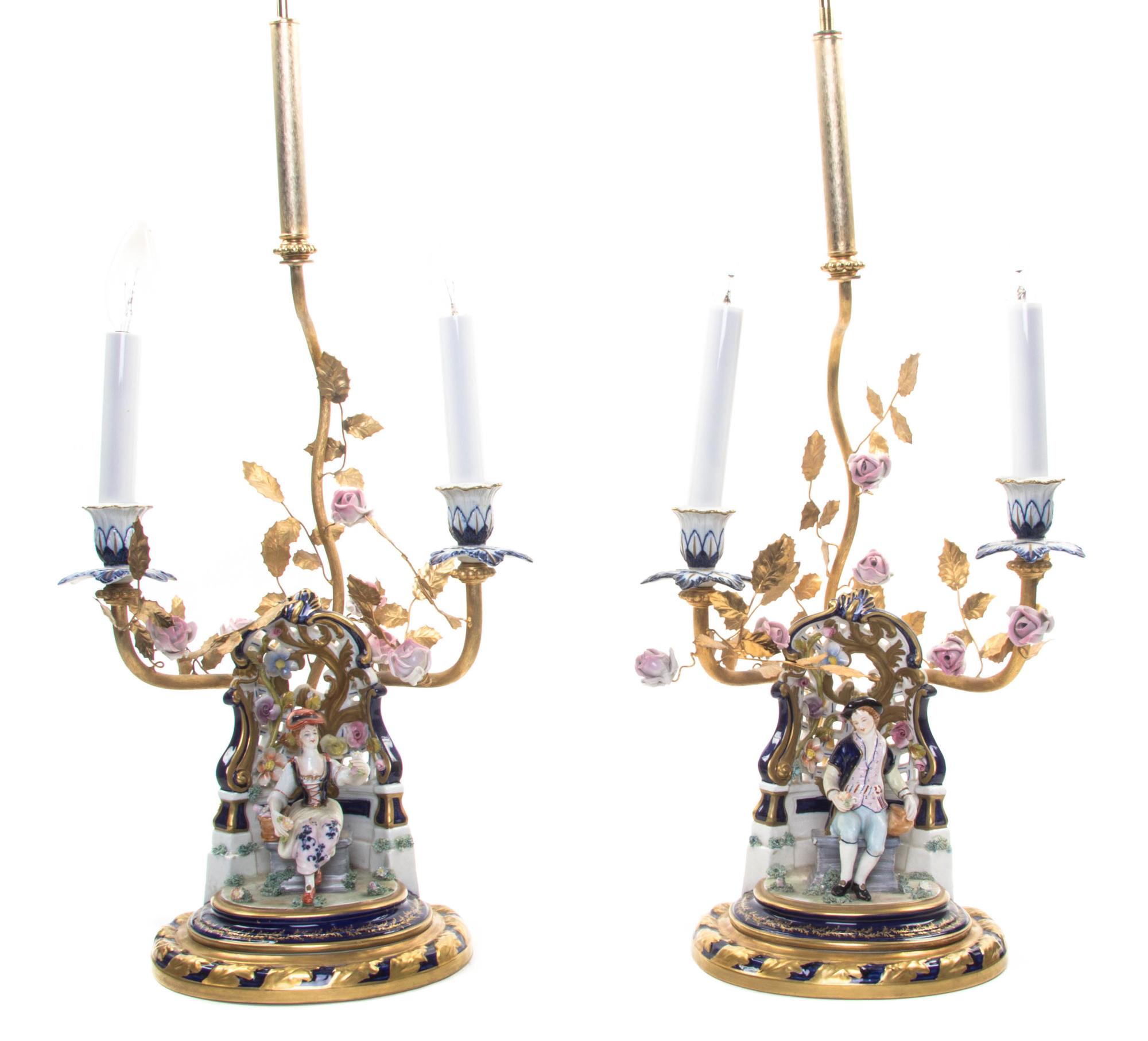 A Pair of German Porcelain Gilt Bronze Mounted Two-Light Candelabra, EARLY 20TH CENTURY, Height 31 inches. — EARLY 20TH CENTURY,