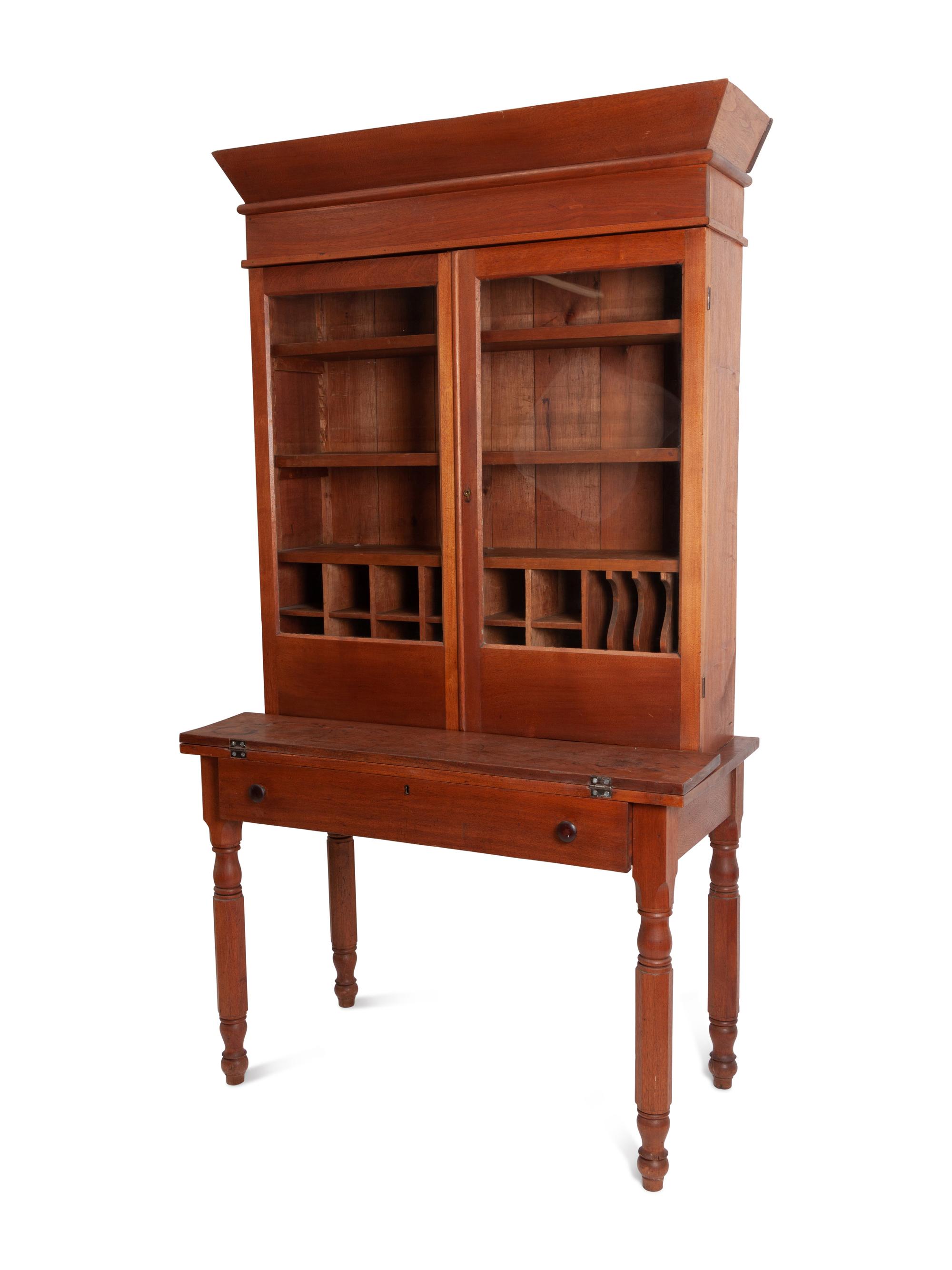 A Late Federal Cherrywood Desk and Bookcase