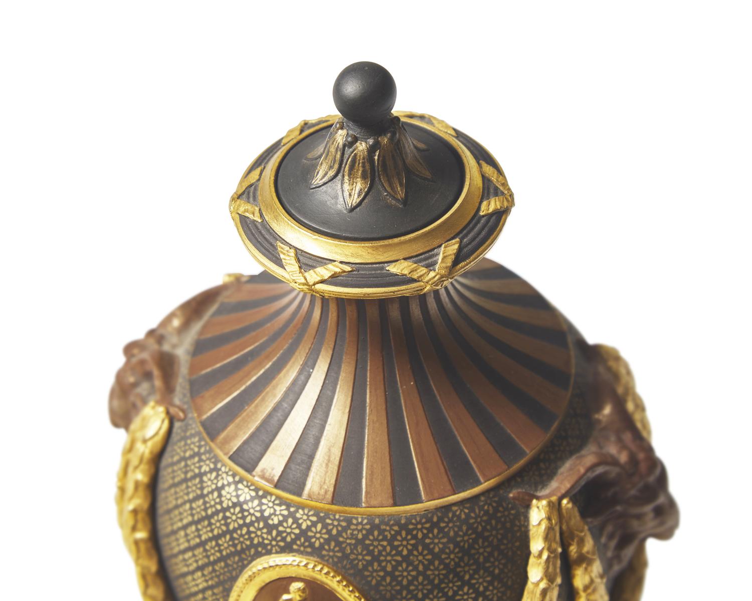 A Wedgwood Brown Glazed and Parcel Gilt Black Basalt Covered Urn