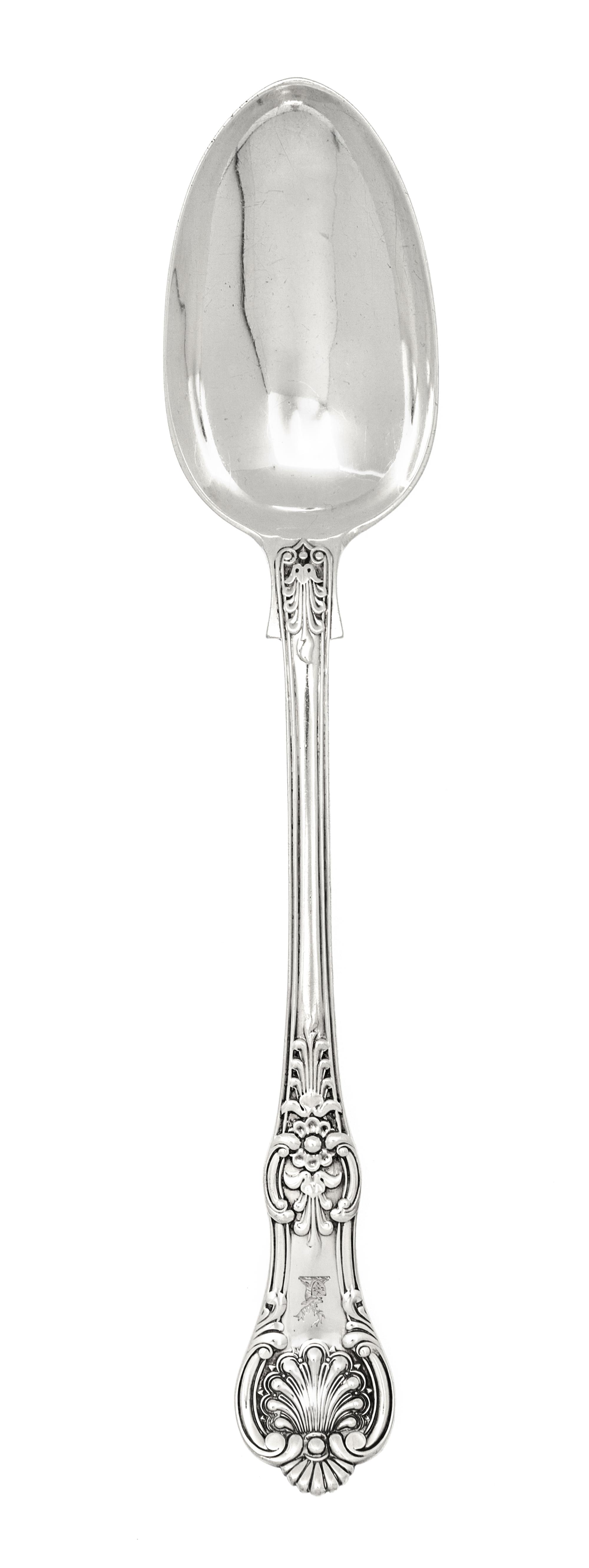 A Victorian Silver Serving Spoon, George William Adams, London, 1864, with a shell and foliate decorated handle.