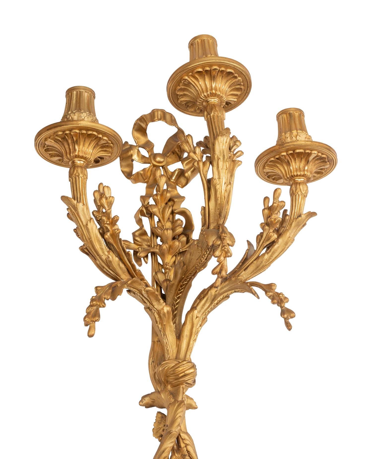 A Pair of Louis XVI Style Gilt Bronze Three-Light Sconces