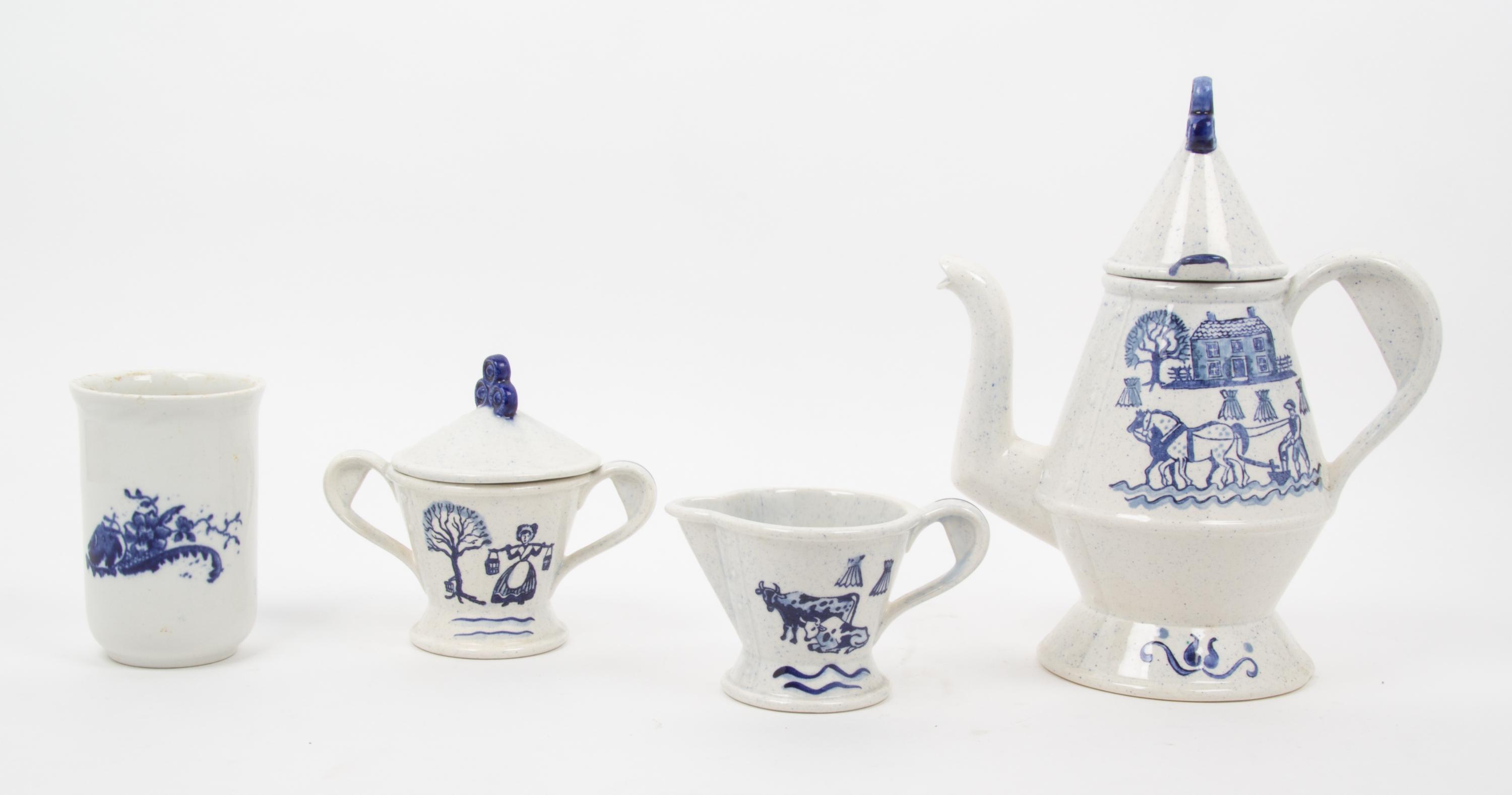 A Set of French Porcelain Serving Articles Height of coffee pot 11 1/4 inches.