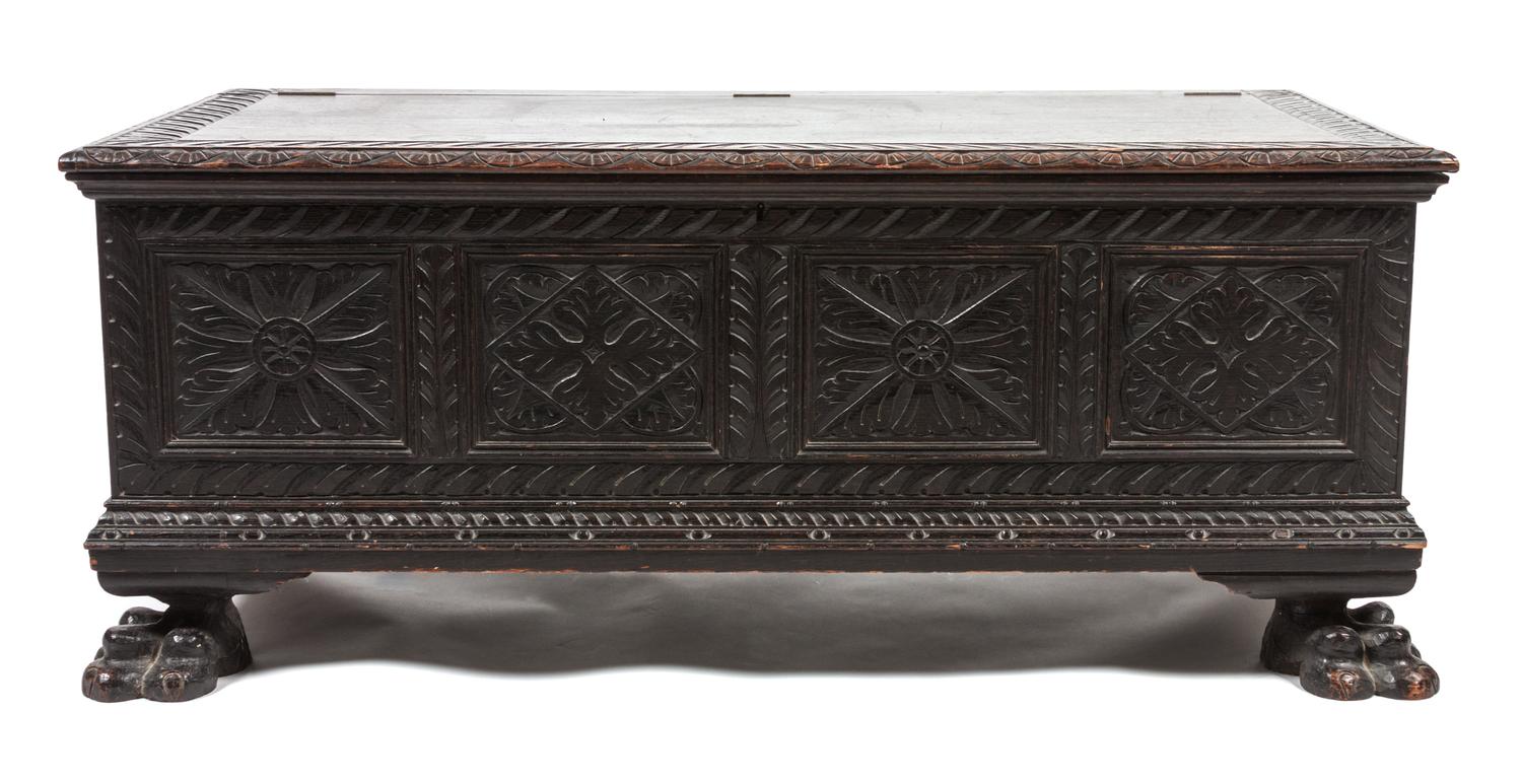 A Continental Carved Wooden Chest Height 20 1/2 x width 48 x depth 24 inches.