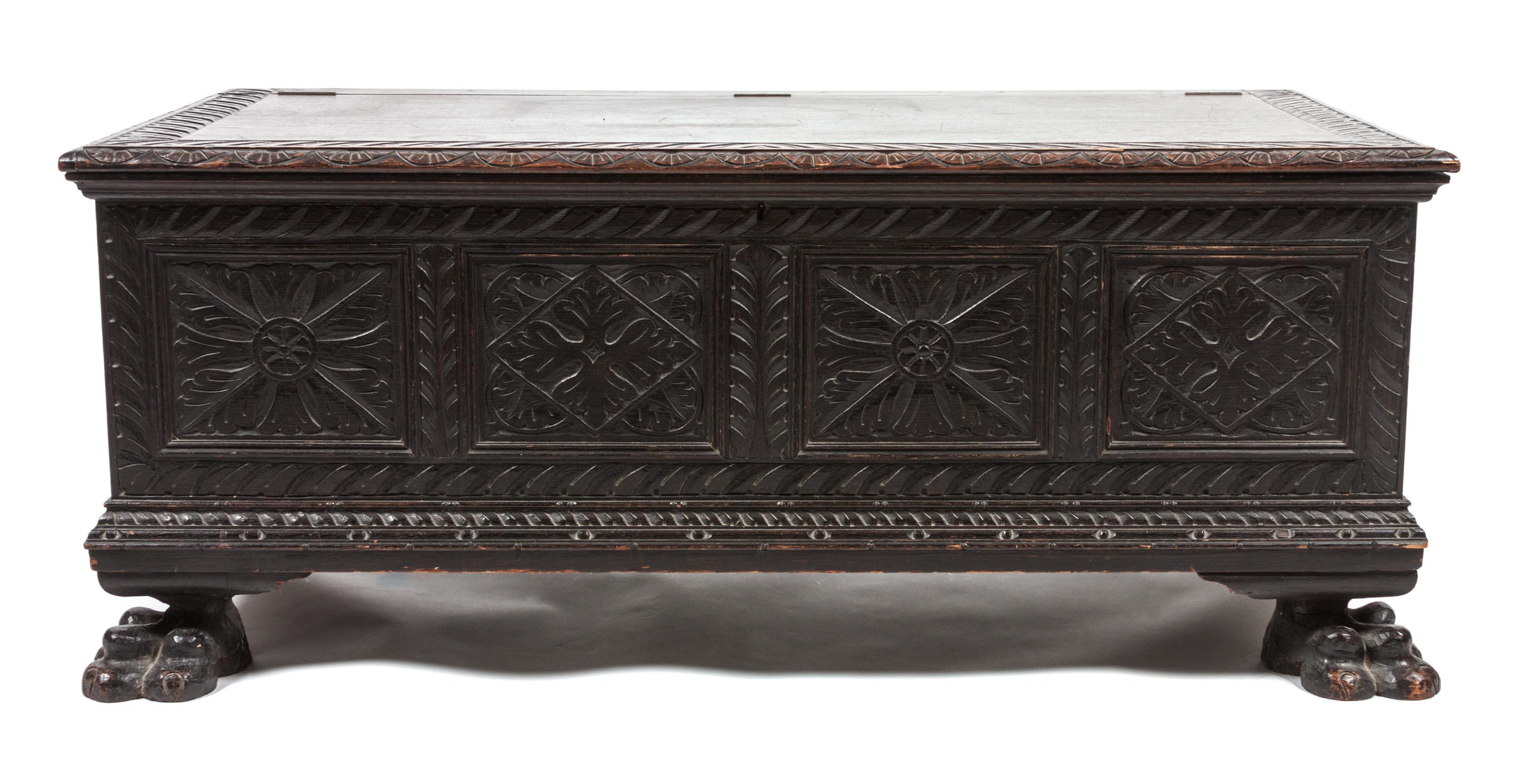 A Continental Carved Wooden Chest Height 20 1/2 x width 48 x depth 24 inches.