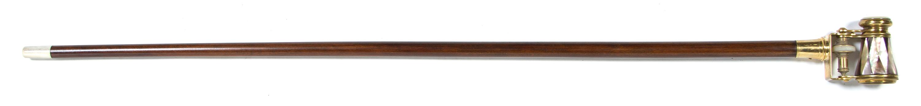 A French Mother-of-Pearl Veneered Monocular Mounted Cane, Height overall 36 1/8 x width of handle open 3 5/8 inches.