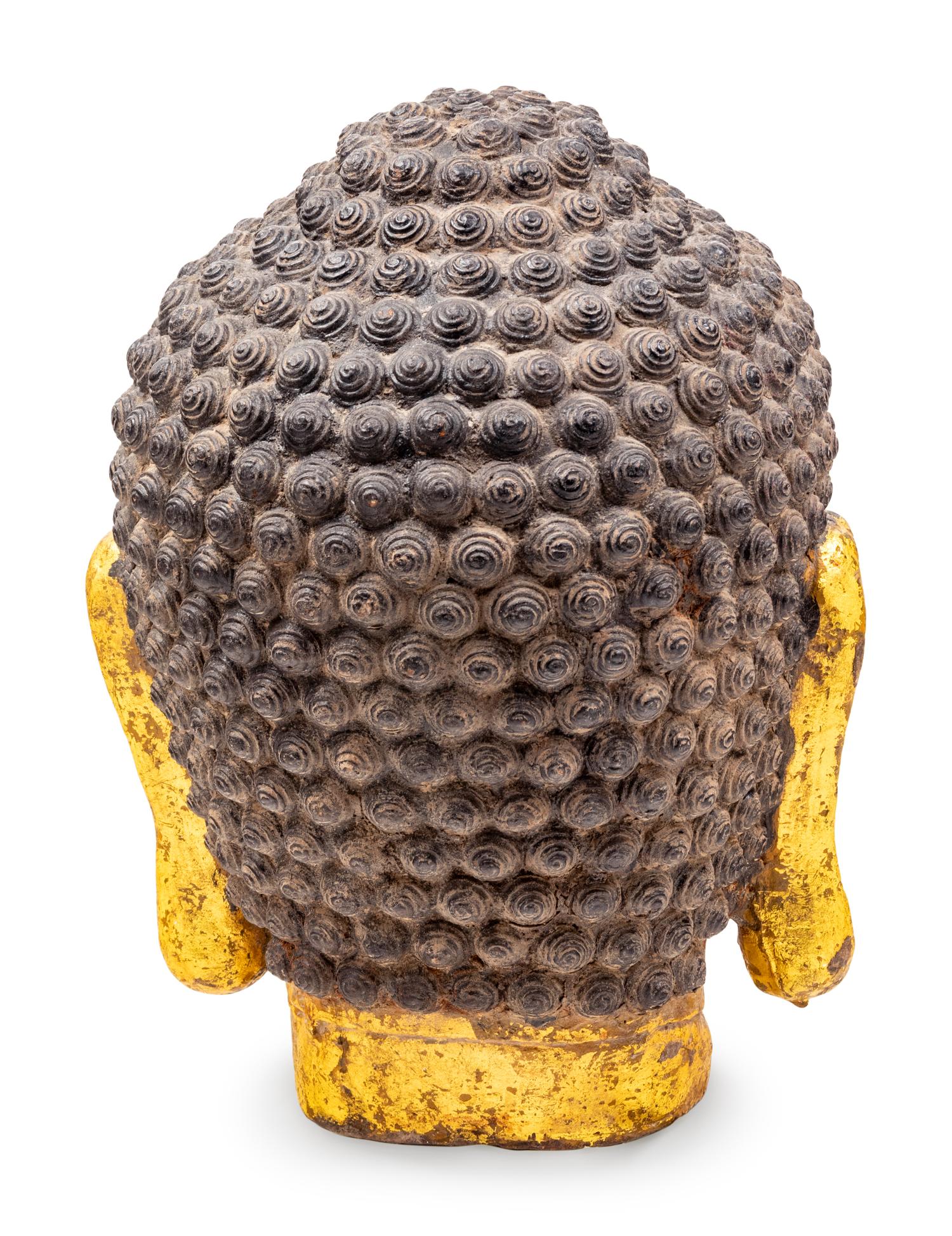 A Contemporary Giltwood Head of Buddha