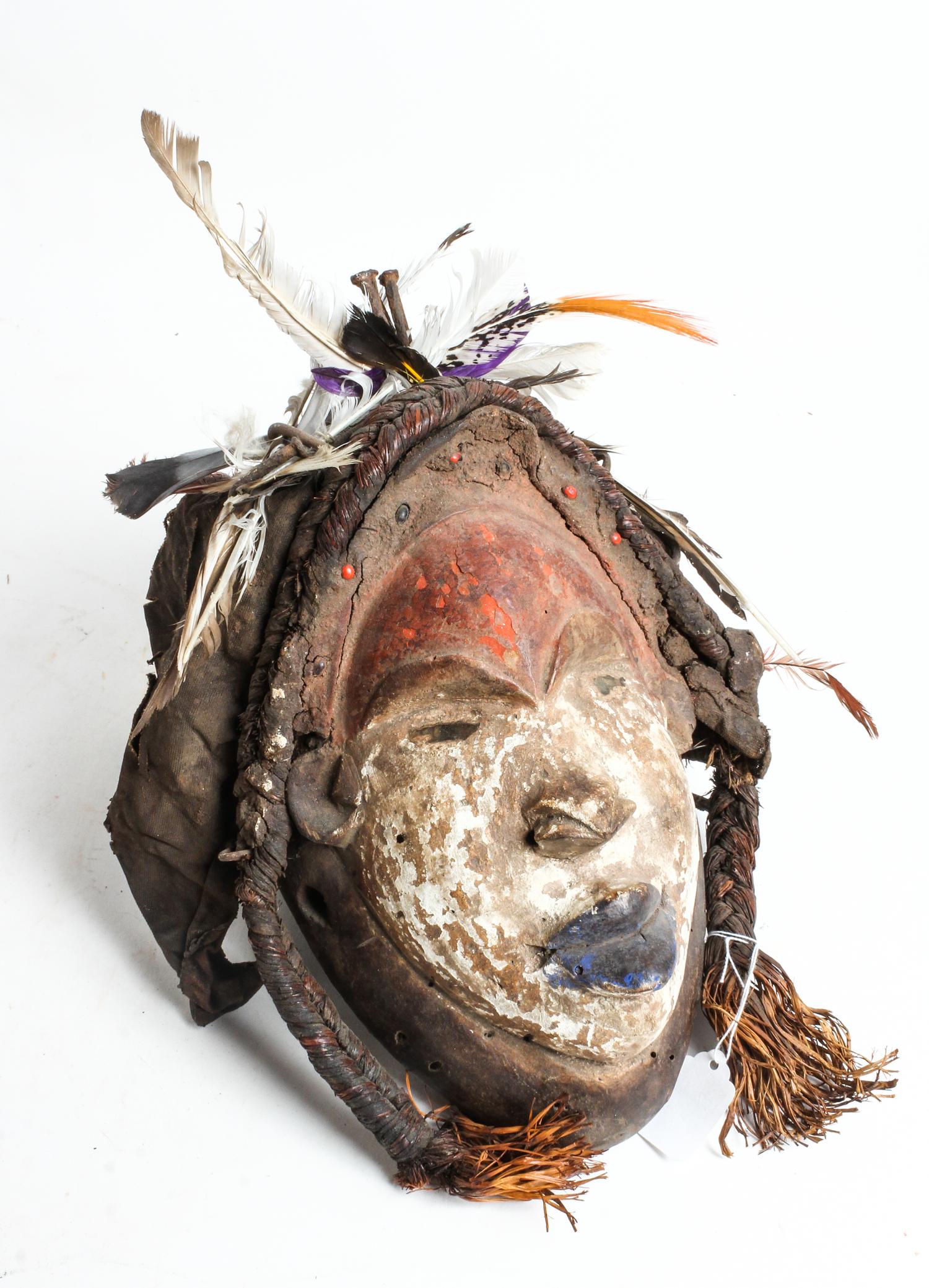 An African Carved Mask Height 11 inches.