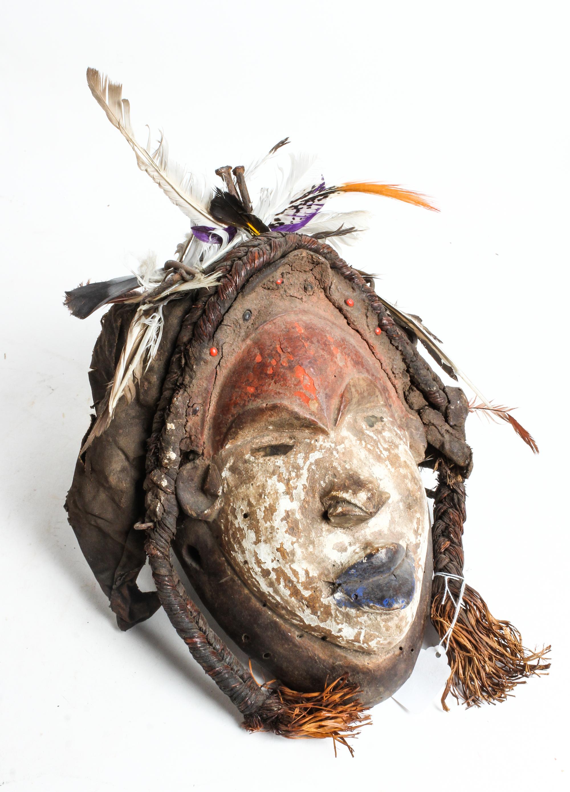 An African Carved Mask Height 11 inches.
