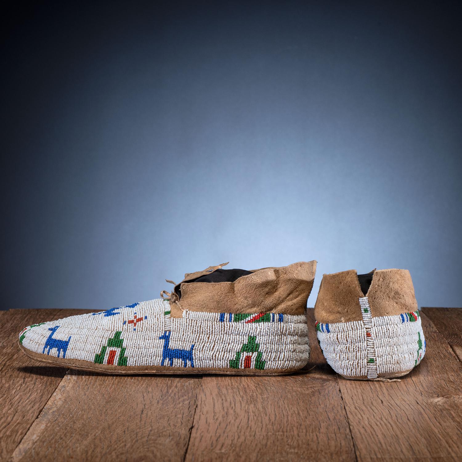Cheyenne Beaded Buffalo Hide Moccasins, with Thunderbirds and Deer