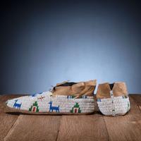 Cheyenne Beaded Buffalo Hide Moccasins, with Thunderbirds and Deer