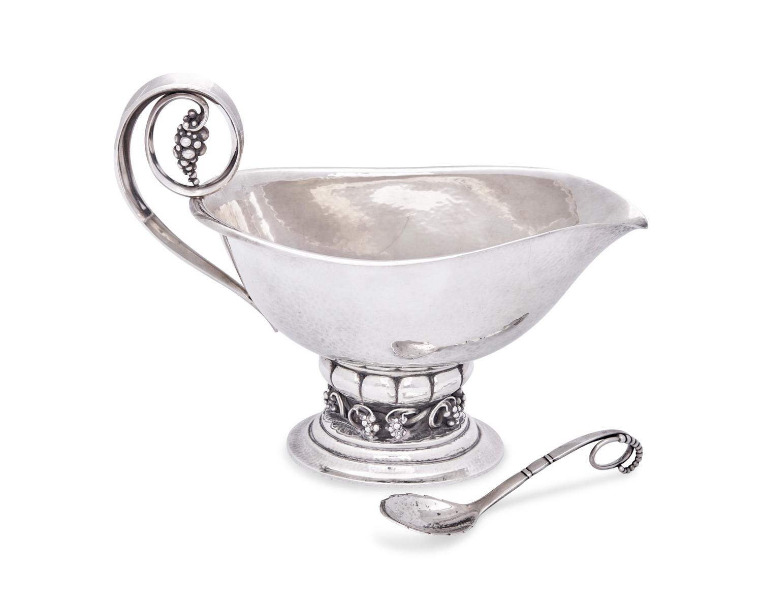 A Georg Jensen Grapevine Sauceboat with Associated Sugar Scoop