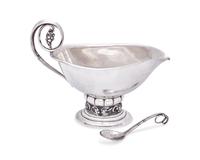 A Georg Jensen Grapevine Sauceboat with Associated Sugar Scoop