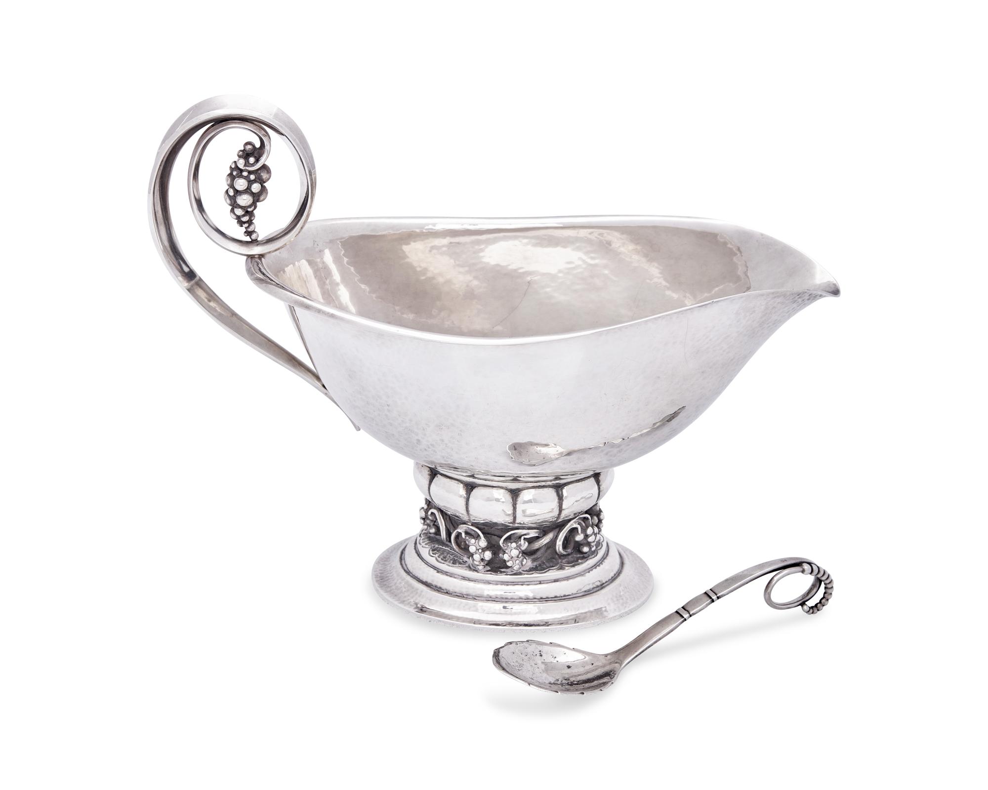 A Georg Jensen Grapevine Sauceboat with Associated Sugar Scoop